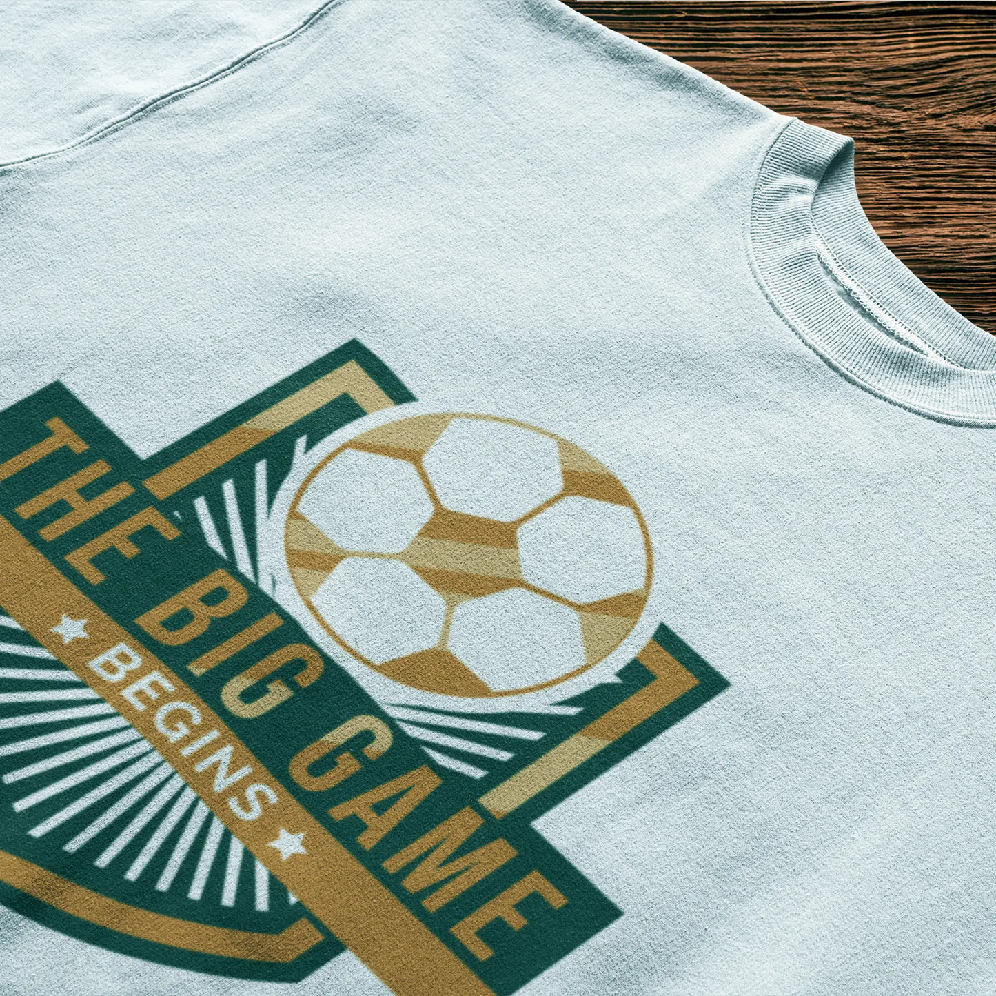 A minimal yet impactful "The Big Game Begins" design stands out sharply on a white t-shirt. -
Ένα μινιμαλιστικό αλλά επιβλητικό design "The Big Game Begins" ξεχωρίζει έντονα πάνω σε λευκό t-shirt.
