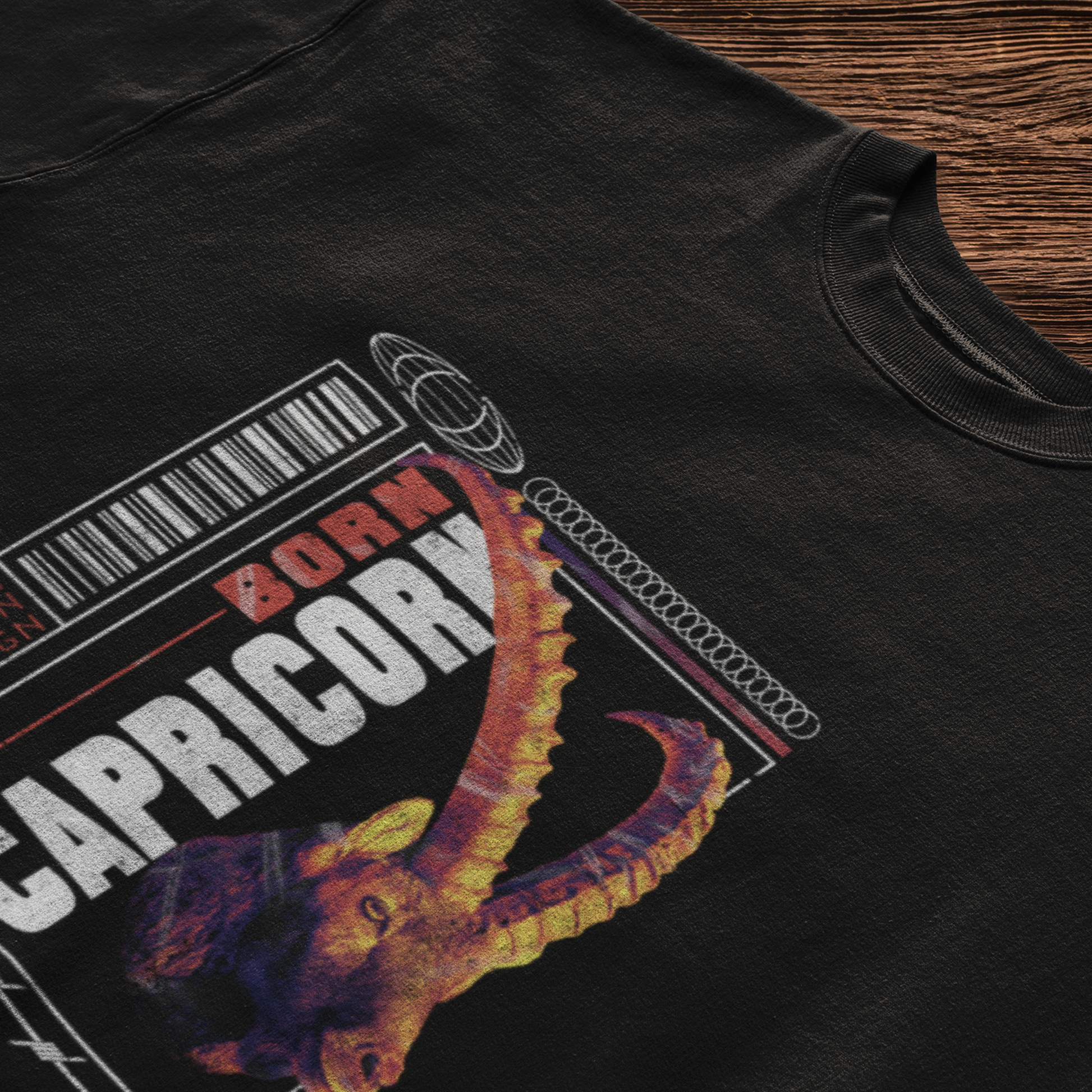 Black earth sign tee with strong typographic design emphasizing Capricorn's grounded and practical nature / Μαύρο earth sign μπλουζάκι με δυνατό typographic σχέδιο που δίνει έμφαση στη γήινη και πρακτική φύση του Αιγόκερου