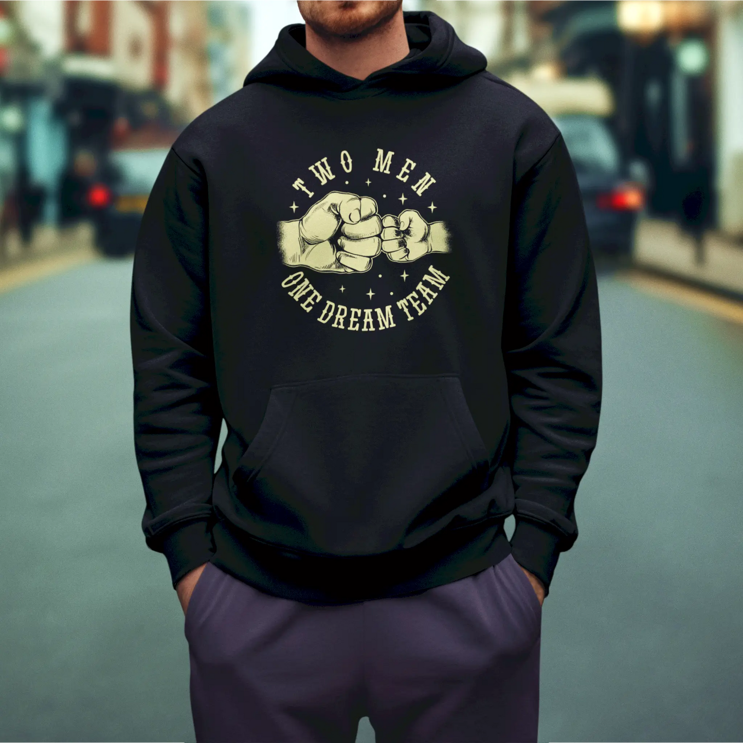 Black hoodie with a striking "father-son team" quote, offering warmth and unity / Μαύρο hoodie με δυναμικό μήνυμα, συνδυάζοντας άνεση και ενότητα.