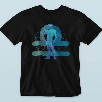 Black t-shirt with a Libra scales zodiac motif for a balanced lifestyle – Μαύρο μπλουζάκι με μοτίβο ζωδιακού Ζυγού και ζυγαριάς για ισορροπημένο τρόπο ζωής.