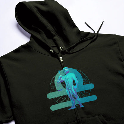 Black zip-up hoodie with the Libra zodiac emblem, an ideal gift for astrology fans – Μαύρη ζακέτα με κουκούλα και φερμουάρ που φέρει το έμβλημα του Ζυγού, το ιδανικό δώρο για τους θαυμαστές της αστρολογίας.