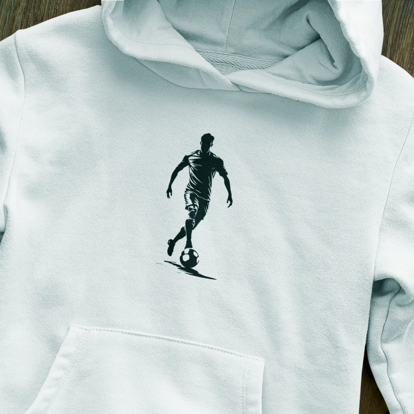 Contemporary hoodie featuring soccer sophistication - modern comfort meets timeless sporting beauty