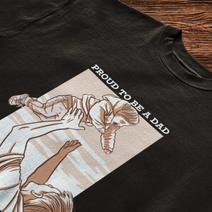 Emotional father-son moment captured on a comfortable black cotton t-shirt / Συναισθηματική στιгμή πατέρα και γιου σε άνετο βαμβακερό μαύρο μπλουζάκι