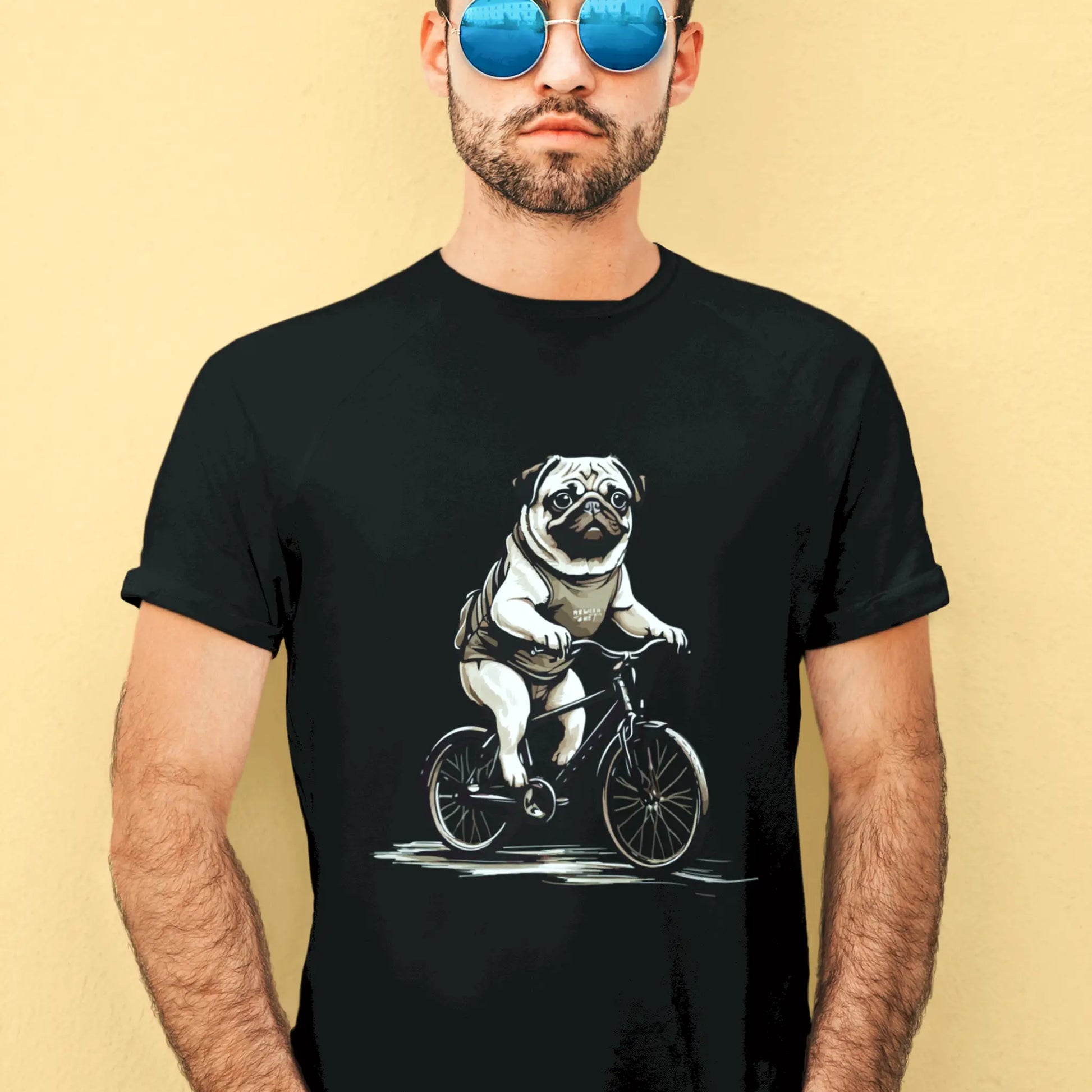 Playful cycling dog design on a relaxed-fit black shirt | Παιχνιδιάρικο σκυλάκι σε ποδήλατο πάνω σε άνετη μαύρη μπλούζα
