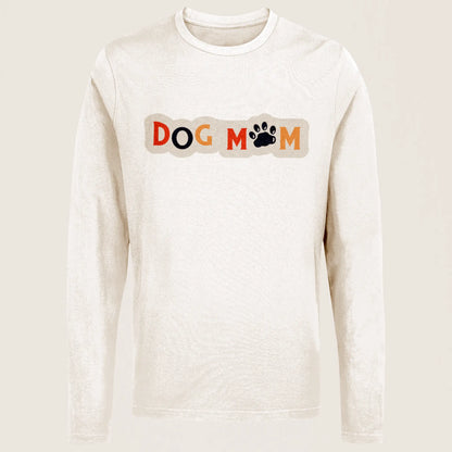 This white long sleeve shirt embodies both softness and devotion through its gentle colors and bold paw symbol – Αυτό το λευκό μακρυμάνικο μπλουζάκι εκφράζει τρυφερότητα και αφοσίωση μέσα από τα απαλόχρωμα στοιχεία και το έντονο πατουσάκι.