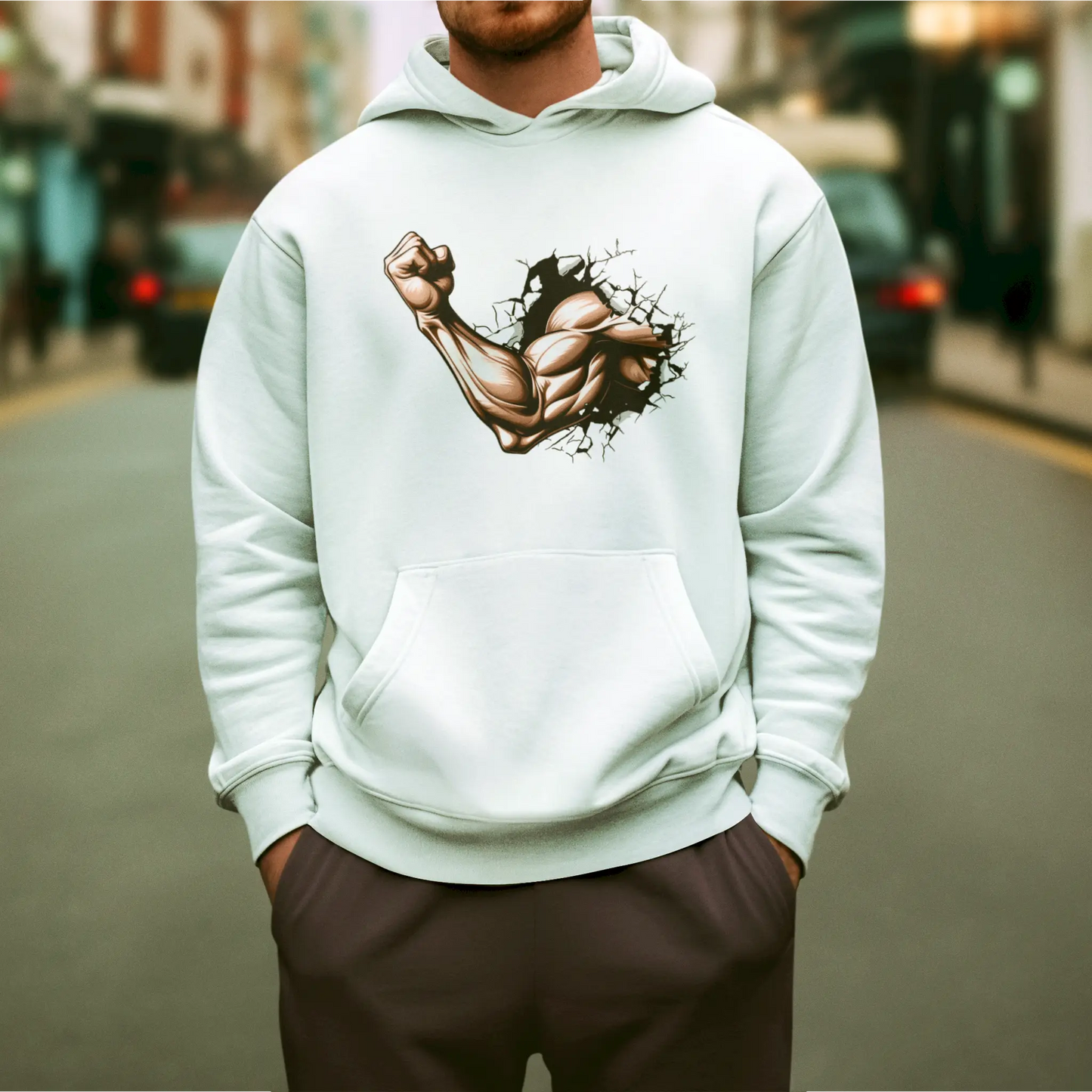 White hoodie featuring gym-inspired graphic of an arm smashing through wall – Λευκό hoodie με γραφικό εμπνευσμένο από το γυμναστήριο και μπράτσο που διαλύει τοίχο.